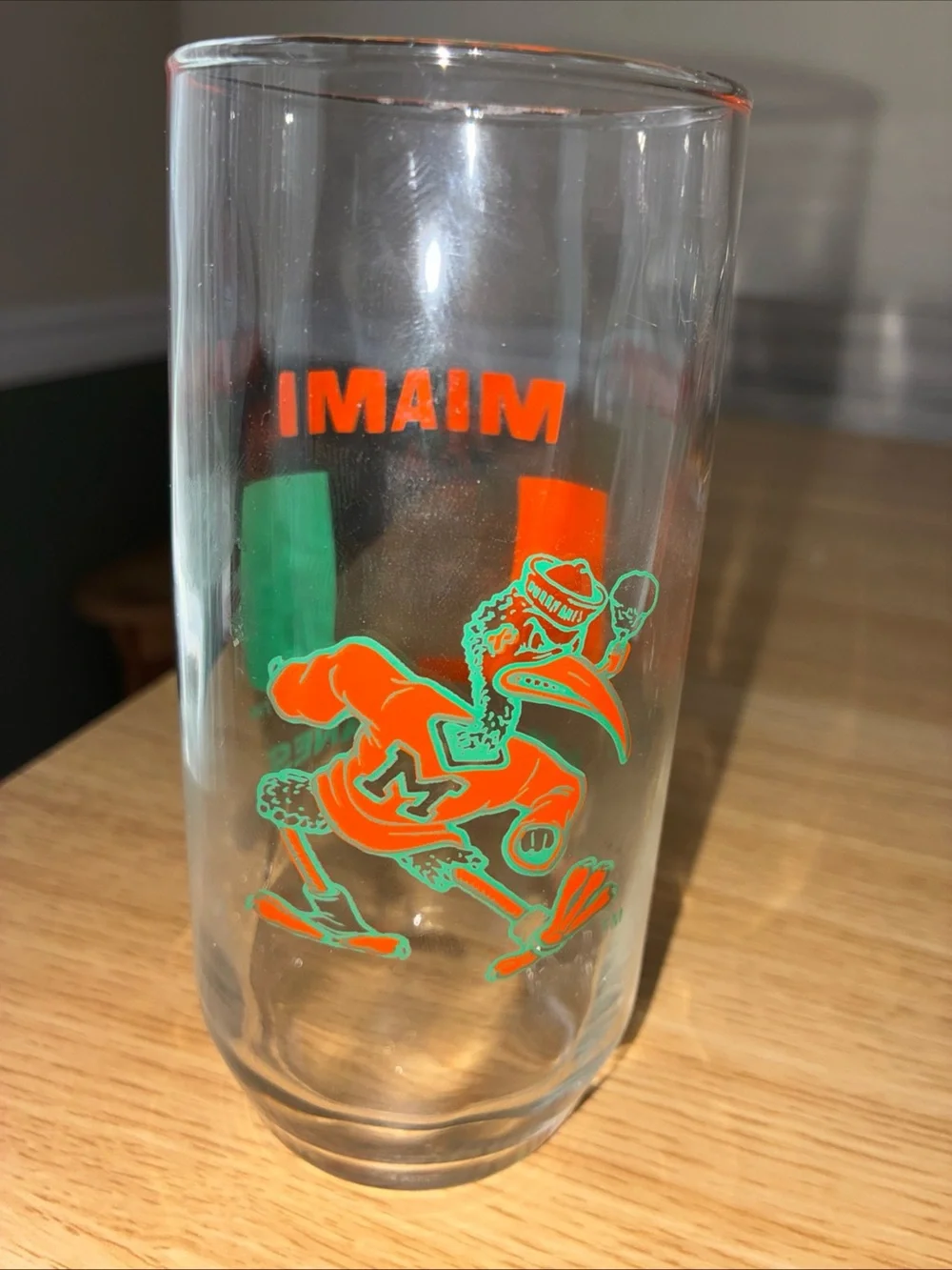 Source Unknown Clear Glasses with Orange and Green Miami Logo